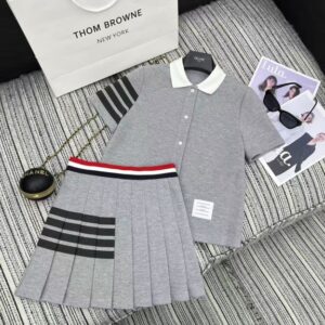 톰브라운 반팔 가디건 탑 플리츠 숏스커트